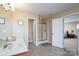 Bathroom with a double vanity, a shower with glass doors, and a separate toilet room at 4915 Juniper Grove Sw Ct, Concord, NC 28027
