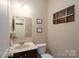 Half bathroom with stylish decor at 4915 Juniper Grove Sw Ct, Concord, NC 28027