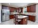 Kitchen with stainless steel appliances, granite countertops and kitchen island at 4915 Juniper Grove Sw Ct, Concord, NC 28027