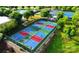 Aerial view of the community pickleball courts; lush landscaping surrounding at 5003 Looking Glass Trl, Denver, NC 28037