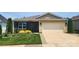 Charming single-story home with a manicured lawn, two car garage and tasteful landscaping at 5003 Looking Glass Trl, Denver, NC 28037