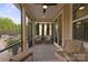 Inviting screened porch featuring neutral furniture and view of the exterior patio at 5003 Looking Glass Trl, Denver, NC 28037