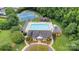 Aerial view of community pool, tennis court, playground, and clubhouse surrounded by green spaces at 508 Whitehead Ct # 328, Fort Mill, SC 29708