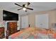 Bedroom featuring a dark wood dresser, carpet, and white closet doors at 508 Whitehead Ct # 328, Fort Mill, SC 29708