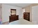 Cozy bedroom has natural lighting and features hardwood furniture, carpet and a connecting door to the rest of the house at 508 Whitehead Ct # 328, Fort Mill, SC 29708