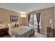 Bright bedroom with plush carpet features a large window and comfortable design; the perfect space for rest and relaxation at 508 Whitehead Ct # 328, Fort Mill, SC 29708