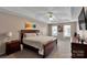Carpeted primary bedroom featuring a ceiling fan, natural light, and neutral walls at 508 Whitehead Ct # 328, Fort Mill, SC 29708