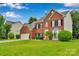 Beautiful two-story brick home with black shutters and a well-maintained front lawn at 508 Whitehead Ct # 328, Fort Mill, SC 29708