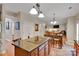 Spacious kitchen with an island cooktop and an open concept layout connecting to the dining and living areas at 508 Whitehead Ct # 328, Fort Mill, SC 29708