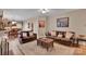 Comfortable living room boasts hardwood floors, neutral paint, and flows into the adjacent kitchen with an open floorplan at 508 Whitehead Ct # 328, Fort Mill, SC 29708