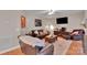 Comfortable living room featuring a leather sofa set, wooden coffee table, and a media center at 508 Whitehead Ct # 328, Fort Mill, SC 29708