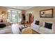 Cozy living room with large bay window providing natural light, hardwood floors and neutral paint at 508 Whitehead Ct # 328, Fort Mill, SC 29708