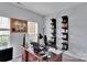 Comfortable home office with natural light, custom shelving, and plenty of workspace at 508 Whitehead Ct # 328, Fort Mill, SC 29708