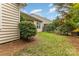 Exterior view of the home with a well-maintained lawn and a fenced backyard at 527 Livingston Dr, Lancaster, SC 29720