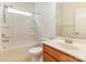 Bathroom featuring a tub and shower, toilet, and single sink with wood cabinets at 527 Livingston Dr, Lancaster, SC 29720