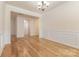 Bright dining area with hardwood floors and access to other rooms at 527 Livingston Dr, Lancaster, SC 29720