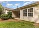 Back of house showing patio, lots of windows, and a view of the well maintained backyard at 527 Livingston Dr, Lancaster, SC 29720