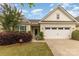 Charming single-story home with landscaped yard, attached garage and security system at 527 Livingston Dr, Lancaster, SC 29720