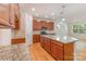 Kitchen with wood cabinets, granite countertops, and stainless steel appliances at 527 Livingston Dr, Lancaster, SC 29720