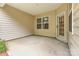 Covered patio with concrete floor and walls, offering a nice outdoor space at 527 Livingston Dr, Lancaster, SC 29720