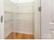 Walk-in closet with wire shelving and hardwood floors at 527 Livingston Dr, Lancaster, SC 29720