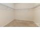 Spacious walk-in closet with carpeted floors and white walls at 527 Livingston Dr, Lancaster, SC 29720