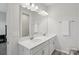 This bathroom features double sinks, a large mirror and new-looking cabinets at 5324 Somerset Hill Ln, Charlotte, NC 28269