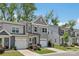Charming two-story townhome with a well-manicured lawn and attached one car garage at 5324 Somerset Hill Ln, Charlotte, NC 28269