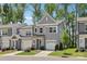 Charming two-story townhome with a well-manicured lawn, attached one car garage and sidewalk at 5324 Somerset Hill Ln, Charlotte, NC 28269