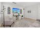 Comfortable living room featuring a cozy seating area, decorative accents, and a modern entertainment setup at 5324 Somerset Hill Ln, Charlotte, NC 28269