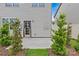 Backyard showcasing a concrete patio and a door to access the home at 5332 Orchid Bloom Dr, Indian Land, SC 29707