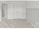 The bedroom features soft neutral carpets and a closet with double doors at 5332 Orchid Bloom Dr, Indian Land, SC 29707