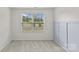 Bright bedroom with a large window and a soothing color palette on the wall at 5332 Orchid Bloom Dr, Indian Land, SC 29707