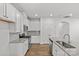 Well-lit kitchen featuring granite countertops, stainless steel appliances, and ample cabinet space for storage at 5332 Orchid Bloom Dr, Indian Land, SC 29707