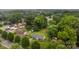 Spacious property featuring a home surrounded by mature trees in a peaceful neighborhood at 5918 Barrington Dr, Charlotte, NC 28215