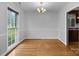 Spacious dining room with natural light and hardwood floors at 5918 Barrington Dr, Charlotte, NC 28215