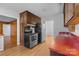 Traditional kitchen with wood cabinets, stainless steel appliances, and red countertops at 5918 Barrington Dr, Charlotte, NC 28215
