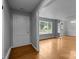 Light and airy living room featuring hardwood floors and an entrance at 5918 Barrington Dr, Charlotte, NC 28215