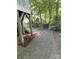 Exterior view of the backyard patio area, landscape and covered grill at 5929 Waterelm Ln, Charlotte, NC 28269