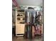 Walk-in closet providing ample storage with rods, shelving, and drawers at 5929 Waterelm Ln, Charlotte, NC 28269