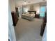 Main bedroom features neutral walls, carpet flooring, a king bed, and dressers on either side at 5929 Waterelm Ln, Charlotte, NC 28269