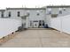 This townhouse features a private, fenced-in backyard with a concrete patio and an air conditioning unit at 609 Atherton Way, Rock Hill, SC 29730