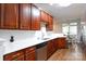 Modern kitchen with stainless steel appliances and wooden cabinets at 609 Atherton Way, Rock Hill, SC 29730