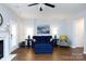 Cozy living room with a fireplace and comfortable seating at 609 Atherton Way, Rock Hill, SC 29730