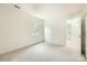 Spacious bedroom with neutral carpet, white walls and trim, and natural light at 6221 Round Hill Rd, Charlotte, NC 28211
