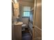 Cozy bathroom with vanity, mirror, and shower/tub combination at 76 Sumner Nw Ave, Concord, NC 28027