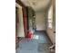 A utility room with a window, shelving, and the home's HVAC system at 76 Sumner Nw Ave, Concord, NC 28027