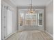 Bright dining area with bay window and door at 8725 Soaring Eagle Ln, Waxhaw, NC 28173