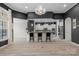 View of the kitchen featuring white cabinets and a breakfast bar at 8725 Soaring Eagle Ln, Waxhaw, NC 28173