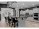 Kitchen featuring a breakfast bar, granite countertops, and stainless steel appliances at 8725 Soaring Eagle Ln, Waxhaw, NC 28173
